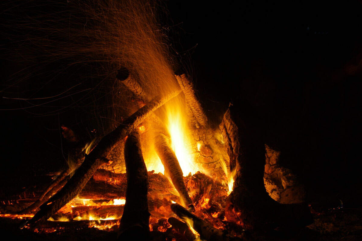 Campfire setup surrounded by nature at Foggy Knolls resort in Vagamon.