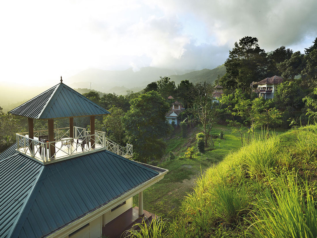 Southern Panorama Indriya Resorts surrounded by greenery in Munnar