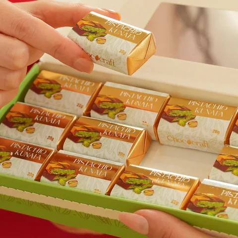 “Kunafa Chocolate featuring crispy kunafa and rich chocolate layered with pistachios, crafted in Dubai.”