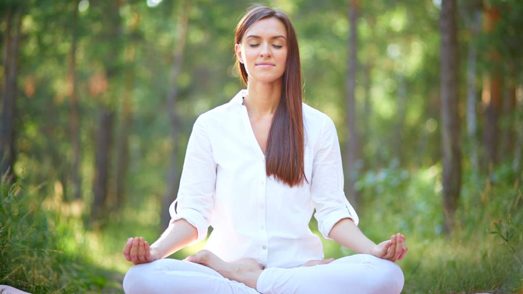 Meditation and yoga at Akantamaya Ayurvedic Resort, Kerala, in a calm beachside atmosphere"