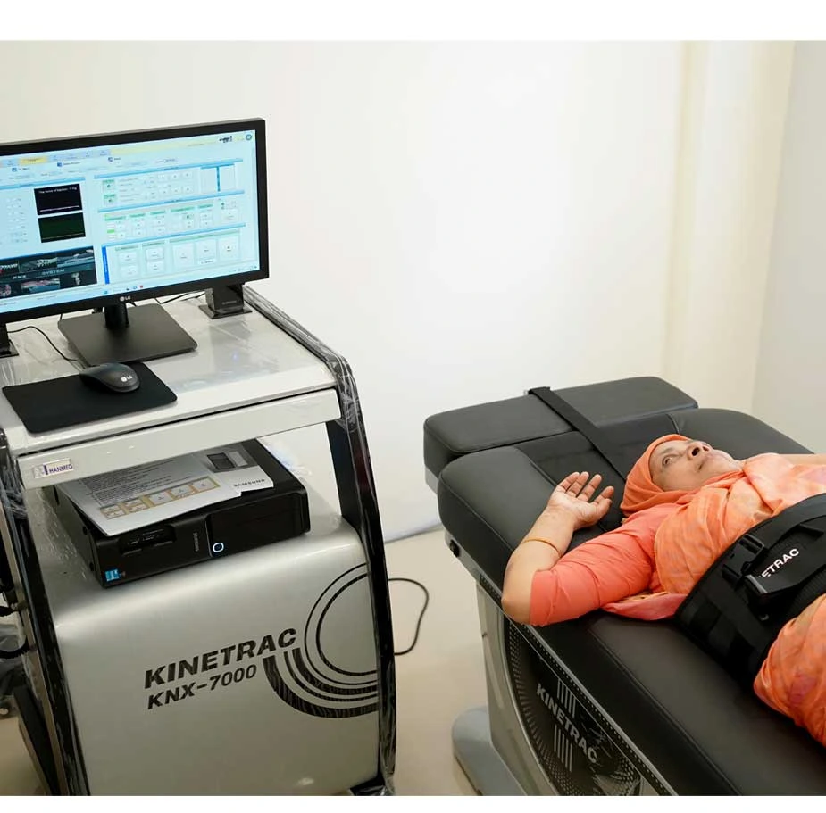 "Patient undergoing spinal decompression therapy Kerala for back pain relief"