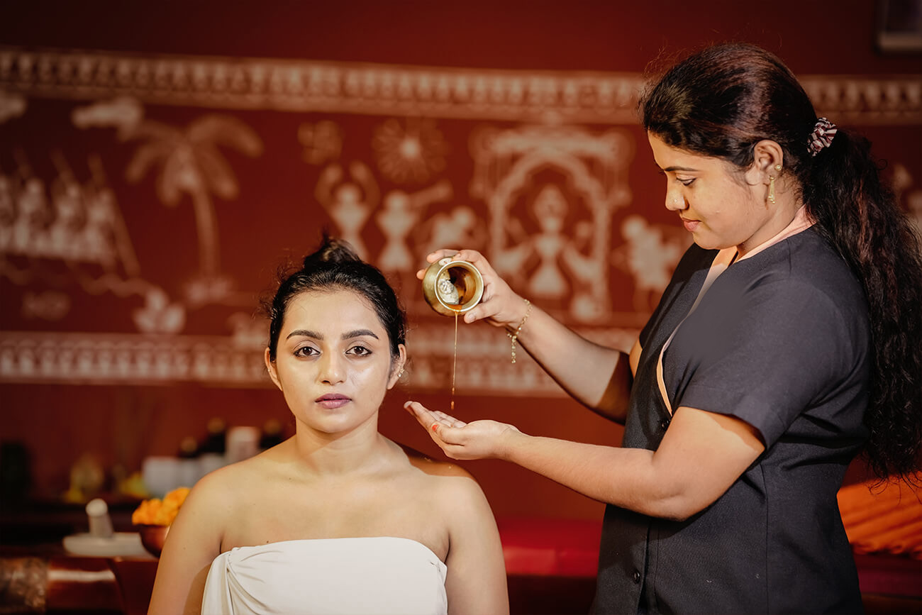 Ayurveda treatment in Akanta Ayurveda Resort in Kerala with traditional oil massage therapy