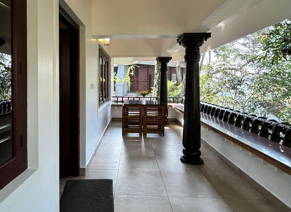 Luxury stay in Munnar surrounded by misty hills, lush tea gardens, and scenic mountain views.