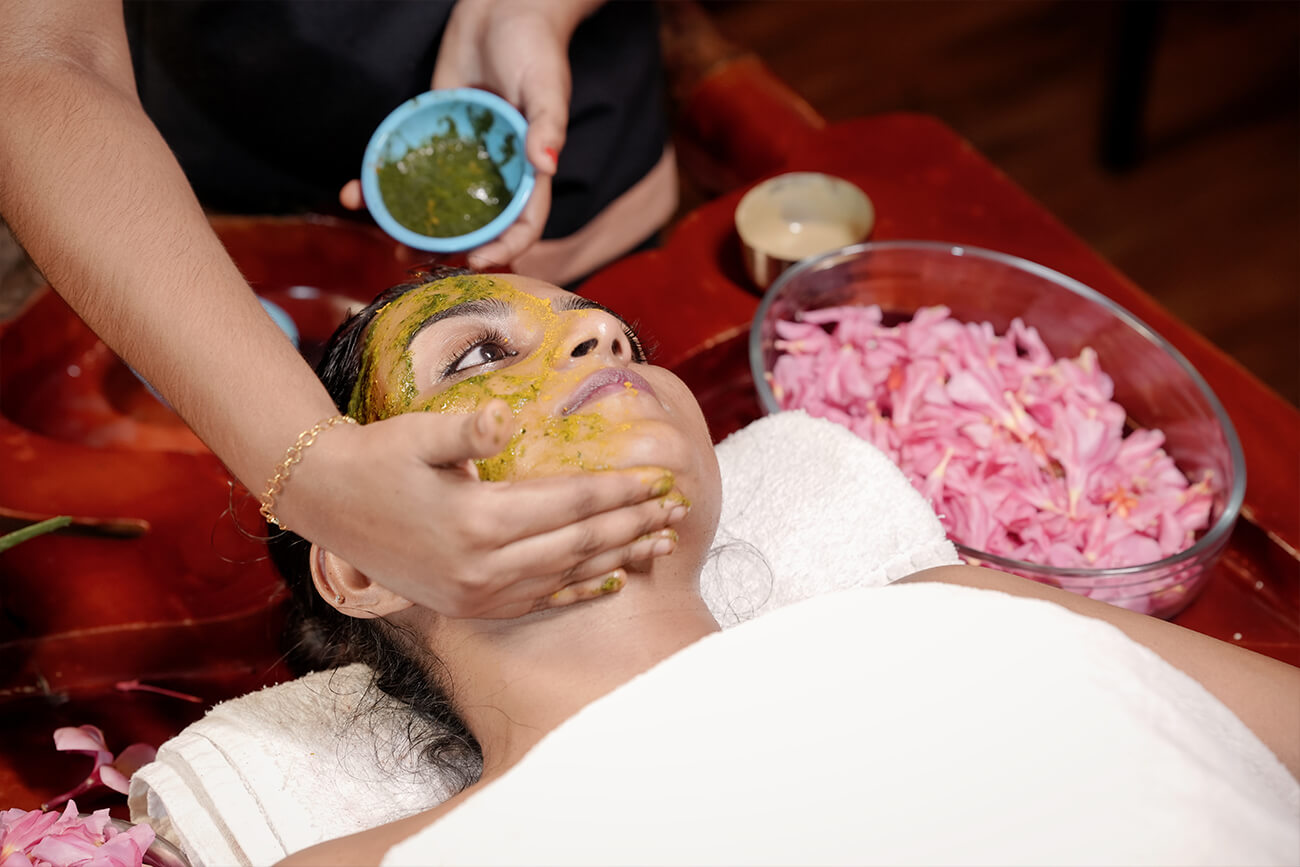 Text: Experience deep relaxation with authentic Ayurvedic therapies that restore balance, release tension, and revitalize your body and mind. Every treatment is tailored to your individual wellness needs.