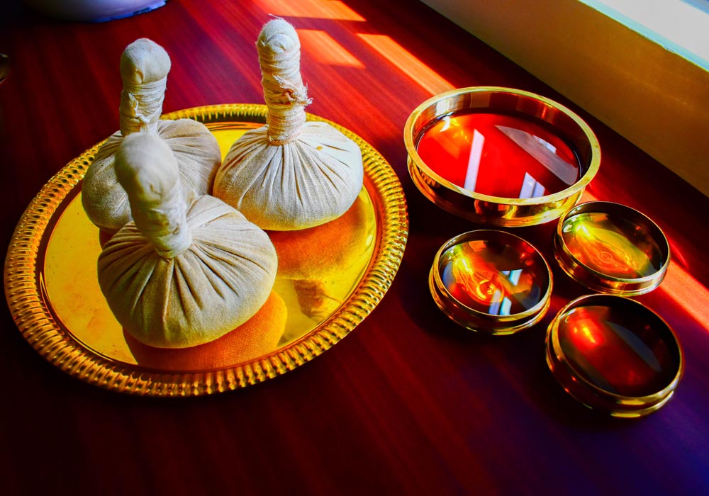 Ayurveda treatment at Nerium Ayurveda in Kochi with herbal oils and traditional therapy