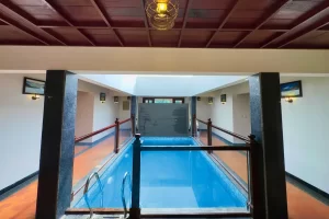 4 bedroom private pool villa at Heaven Inn Munnar surrounded by lush plantations and scenic mountain views in Munnar.