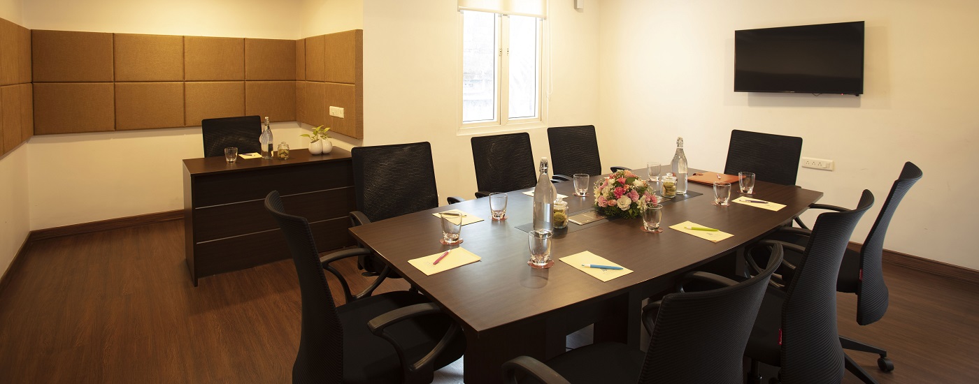 Mist boardroom at Monsoon Empress Kochi designed for executive meetings with modern setup and comfortable seating