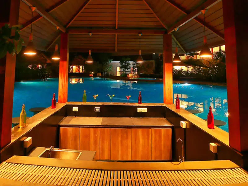 Luxury swimming pool at Morickap Resort spanning 3250 sq. ft., featuring a main pool, kids’ pool, and poolside seating with mocktail bar