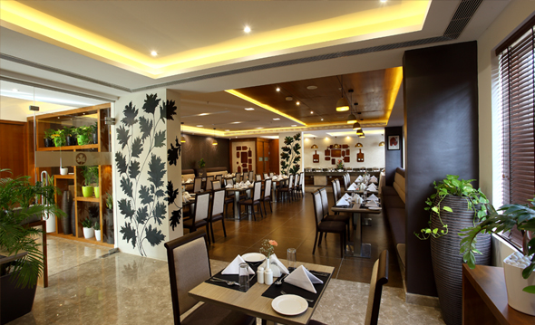 Twelve Tables conference hall at Sugar Business Hotel Kochi with modern seating and corporate meeting setup