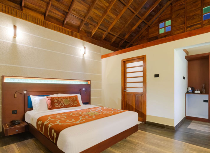 Luxury room at Southern Panorama Indriya in Munnar featuring elegant interiors, spacious layout, and scenic mountain views.