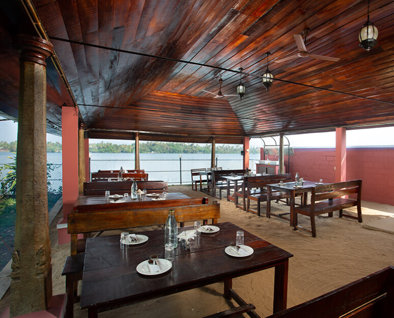 Enjoy wholesome organic vegetarian meals with beautiful river views at the dining area of Akanta Ayurveda & Yoga.