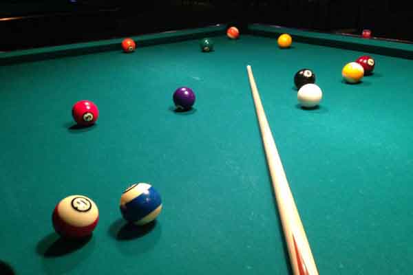 Guests enjoying activities and entertainment at Southern Panorama Indriya Munnar, including indoor games, plantation visits, poolside experiences, and family-friendly recreation.