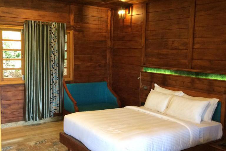 Comfortable and spacious room at Southern Panorama Indriya Munnar featuring elegant interiors, modern amenities, and a relaxing atmosphere.